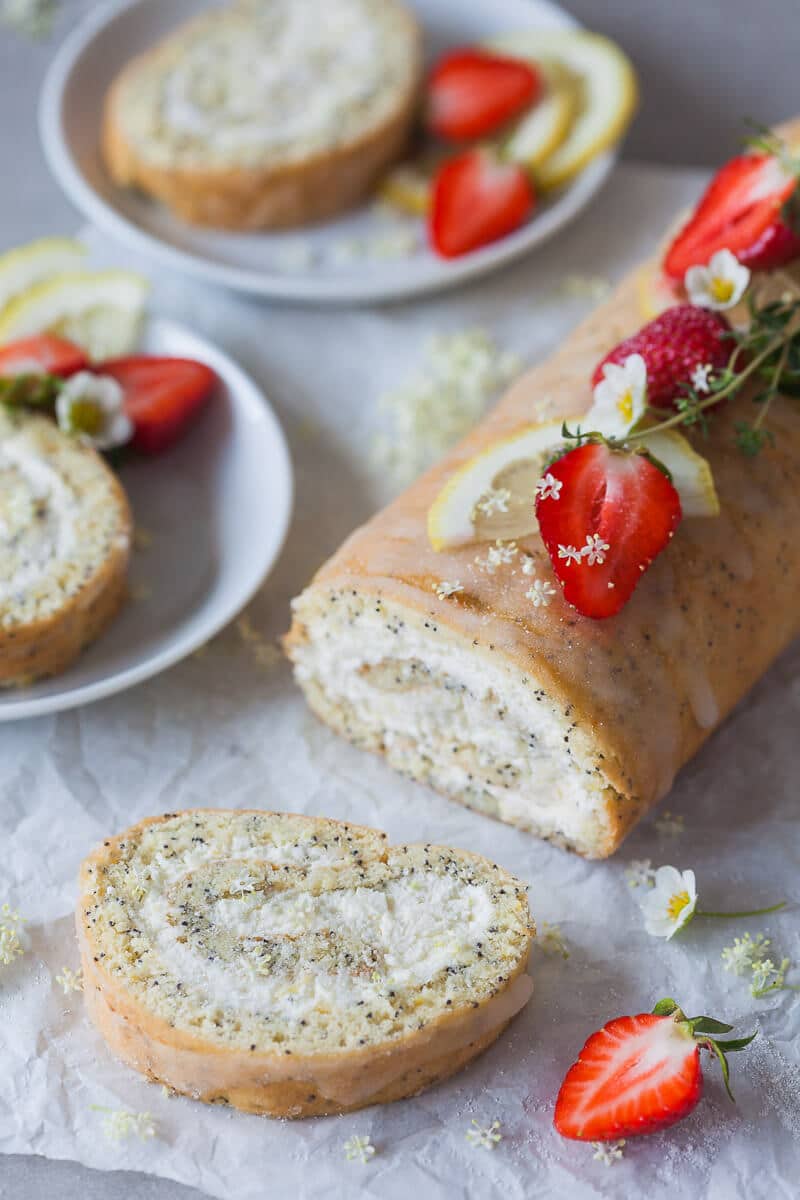 Lemon Poppy Seed Roulade with a light and creamy lemony filling. This is your perfect Sunday dessert. | Vibrant Plate