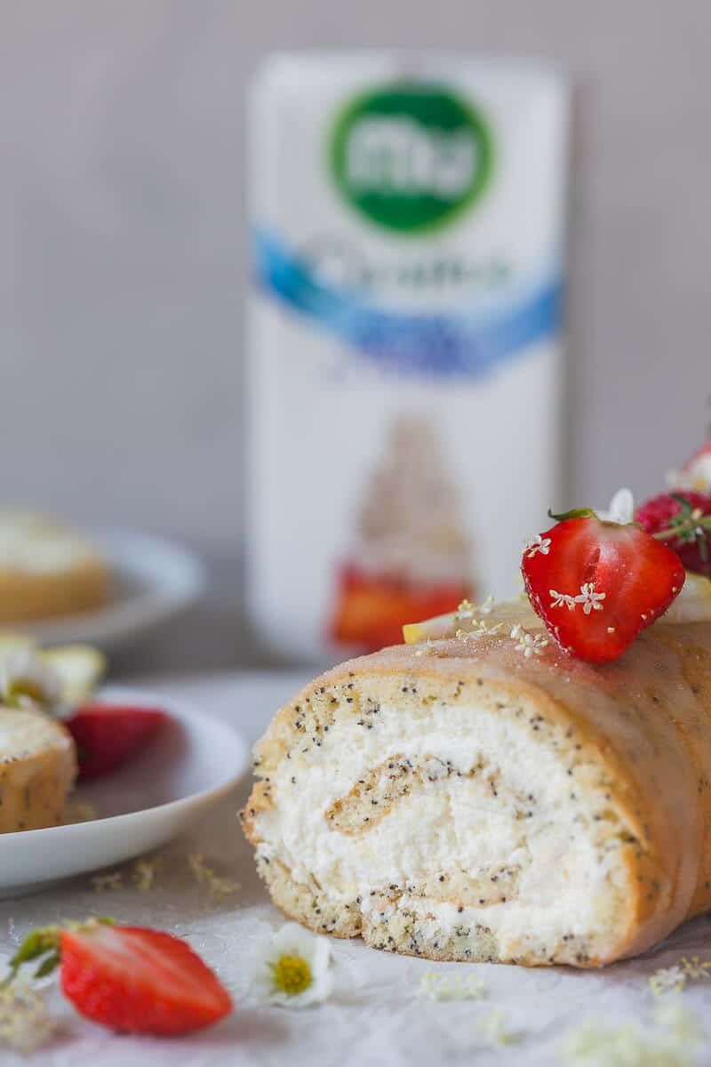 Lemon Poppy Seed Roulade with a light and creamy lemony filling. This is your perfect Sunday dessert. | Vibrant Plate