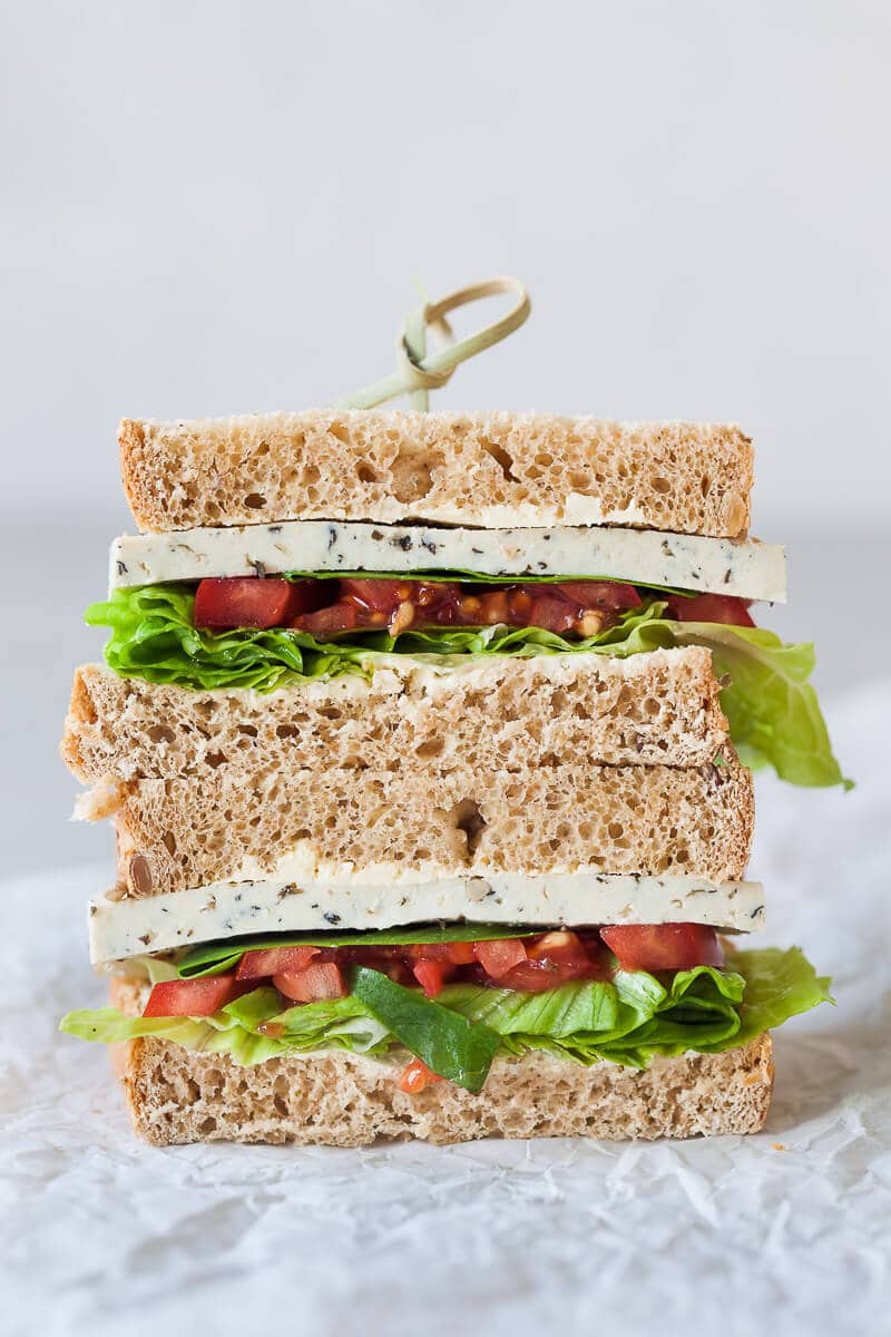 This Vegan Basil Tomato Tofu Sandwich is a quick and easy summer snack idea. Ready in 15 minutes! | Vibrant Plate