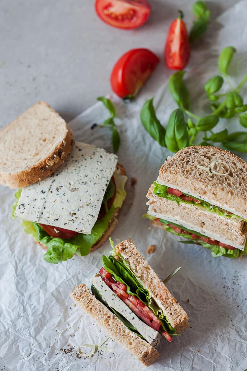 This Vegan Basil Tomato Tofu Sandwich is a quick and easy summer snack idea. Ready in 15 minutes! | Vibrant Plate