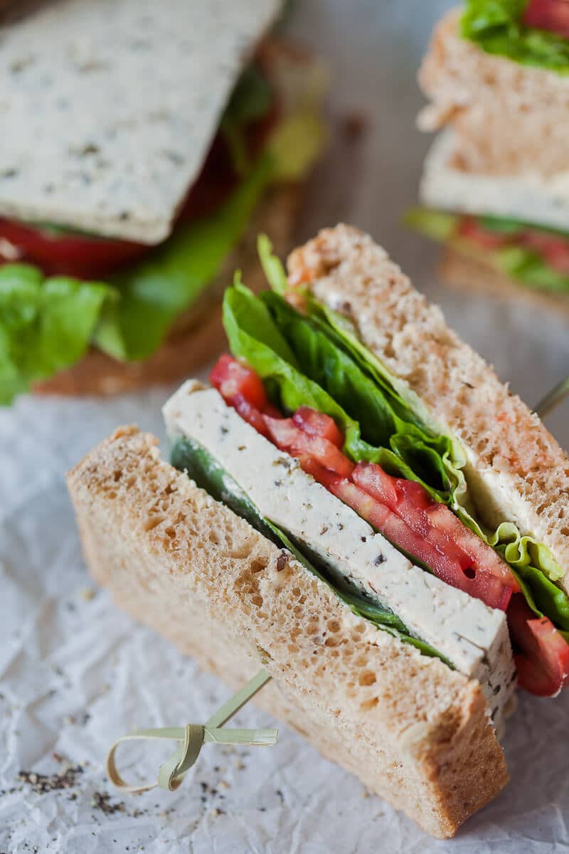 This Vegan Basil Tomato Tofu Sandwich is a quick and easy summer snack idea. Ready in 15 minutes! | Vibrant Plate