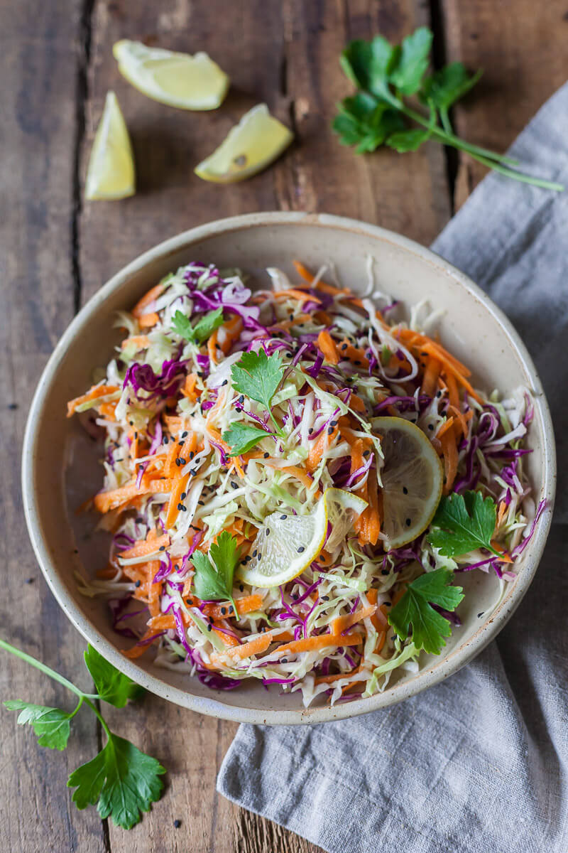 Vegan No Mayo Coleslaw is a light and fresh summer classic without the calories! Just fresh vegetables and a delicious mustard dressing. | Vibrant Plate