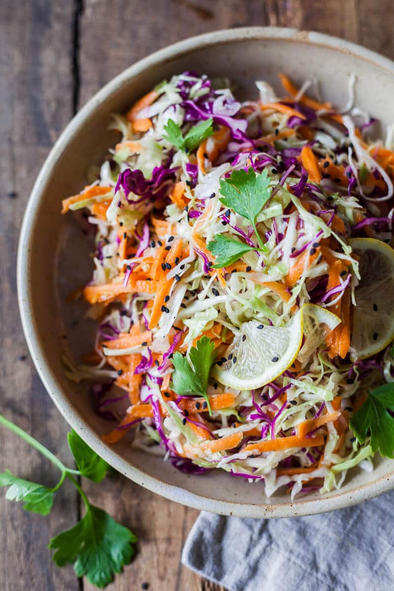 Vegan No Mayo Coleslaw is a light and fresh summer classic without the calories! Just fresh vegetables and a delicious mustard dressing. | Vibrant Plate