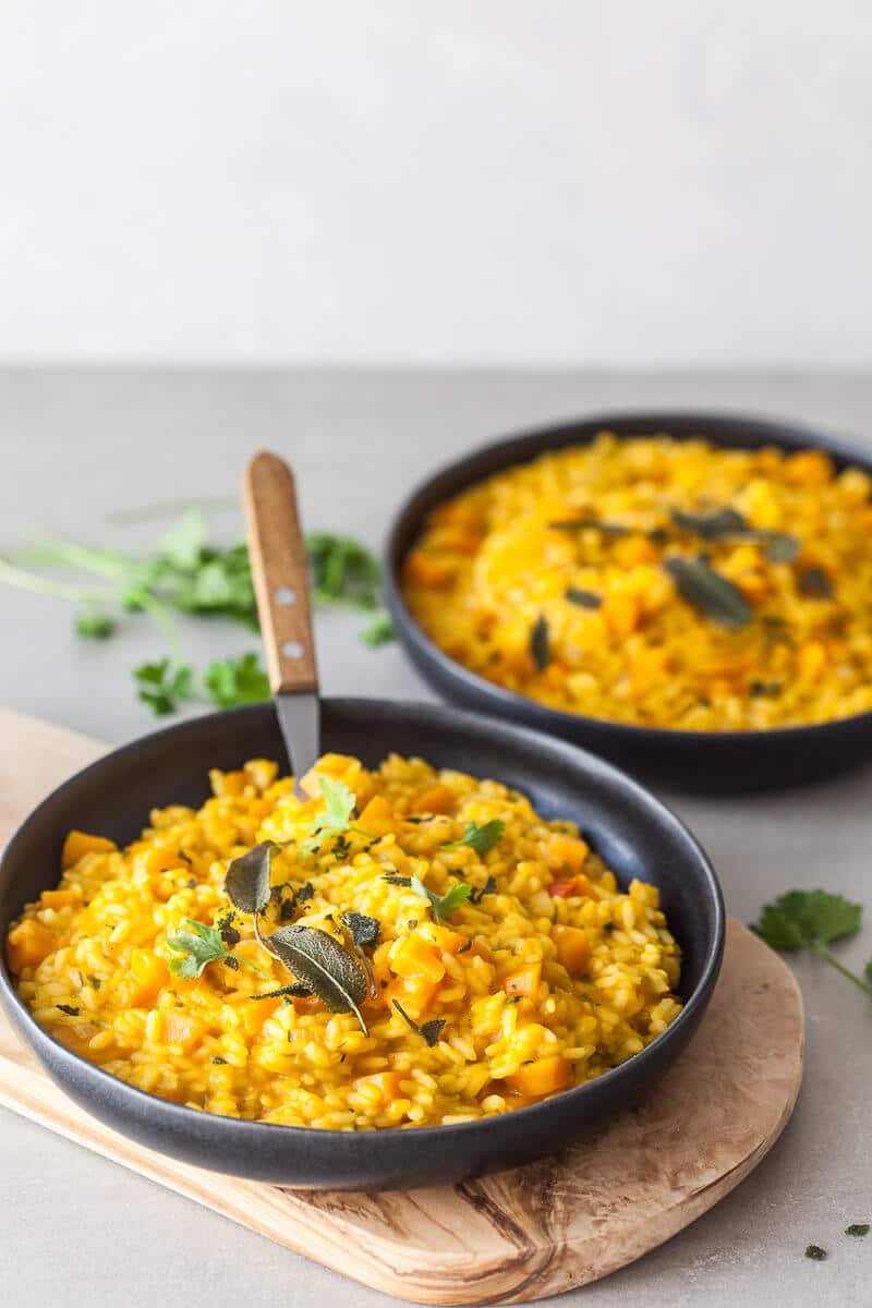 A creamy Vegan Pumpkin Puree Sage Risotto is the perfect meal on a rainy day. Easy & Gluten-Free! | Vibrant Plate