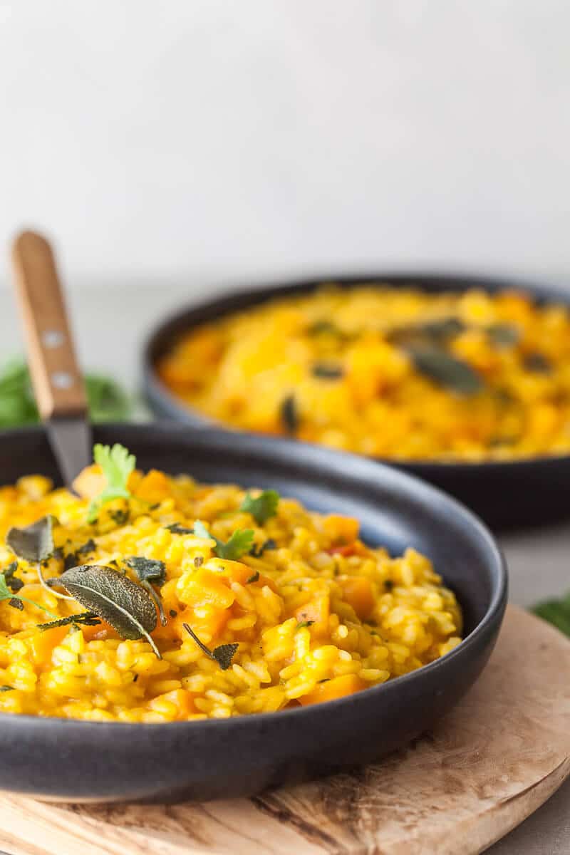 A creamy Vegan Pumpkin Puree Sage Risotto is the perfect meal on a rainy day. Easy & Gluten-Free! | Vibrant Plate