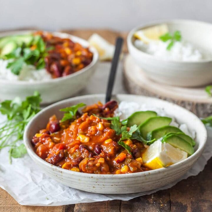 This Easy One-Pot Spicy Vegan Chili is packed with vegetables and ready in just 30 minutes. The perfect winter comfort food! | Vibrant Plate