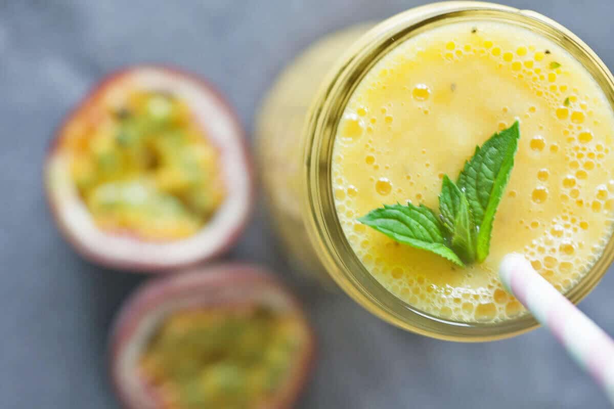 Mango & Passion Fruit Tropical Smoothie Vibrant plate