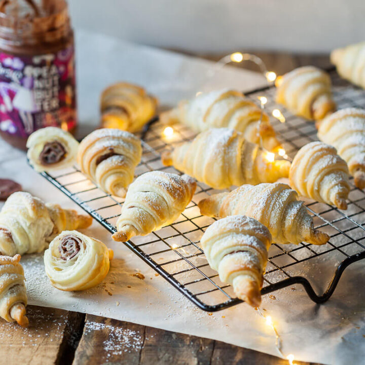 Peanut butter croissants on a cooling rack