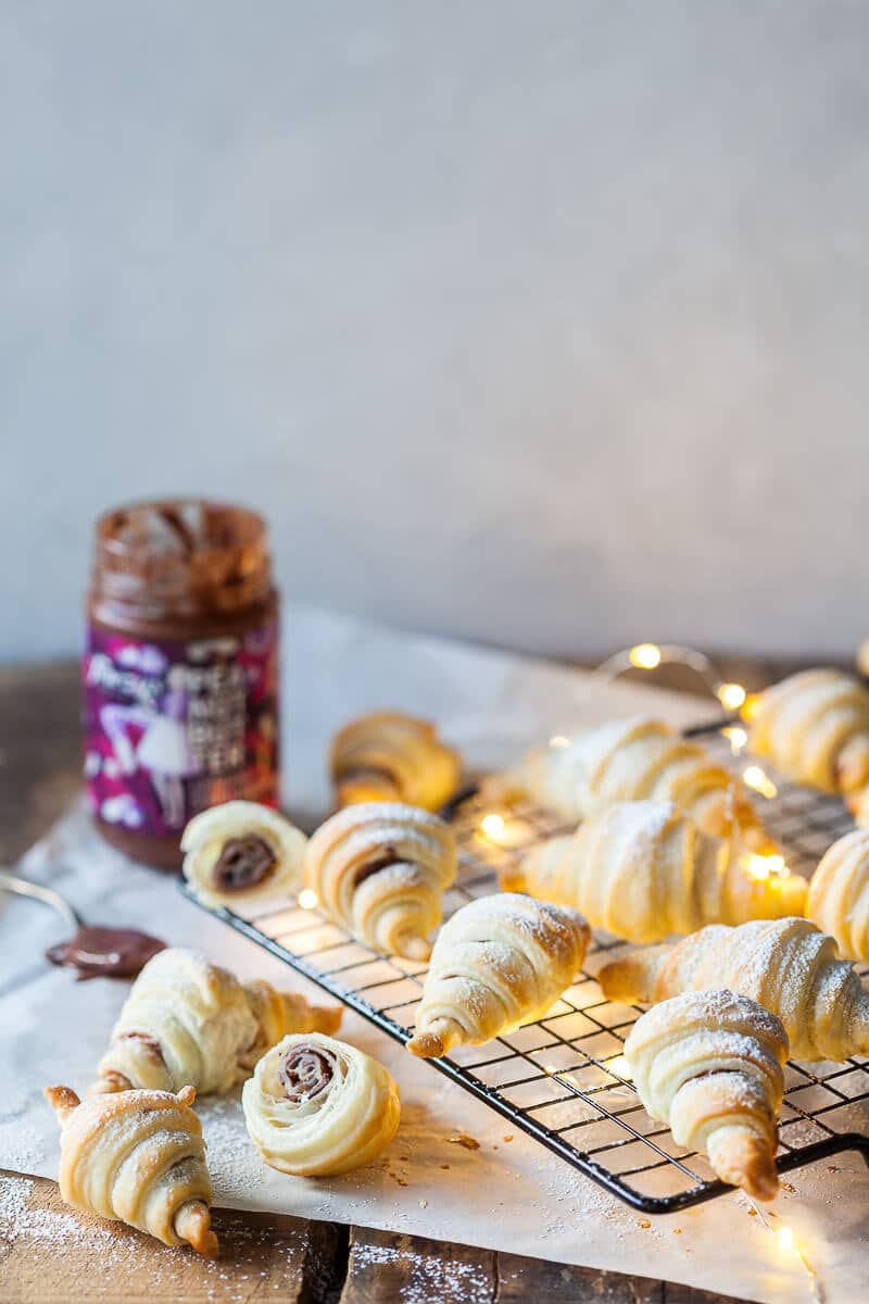 Peanut butter croissants on a cooling rack