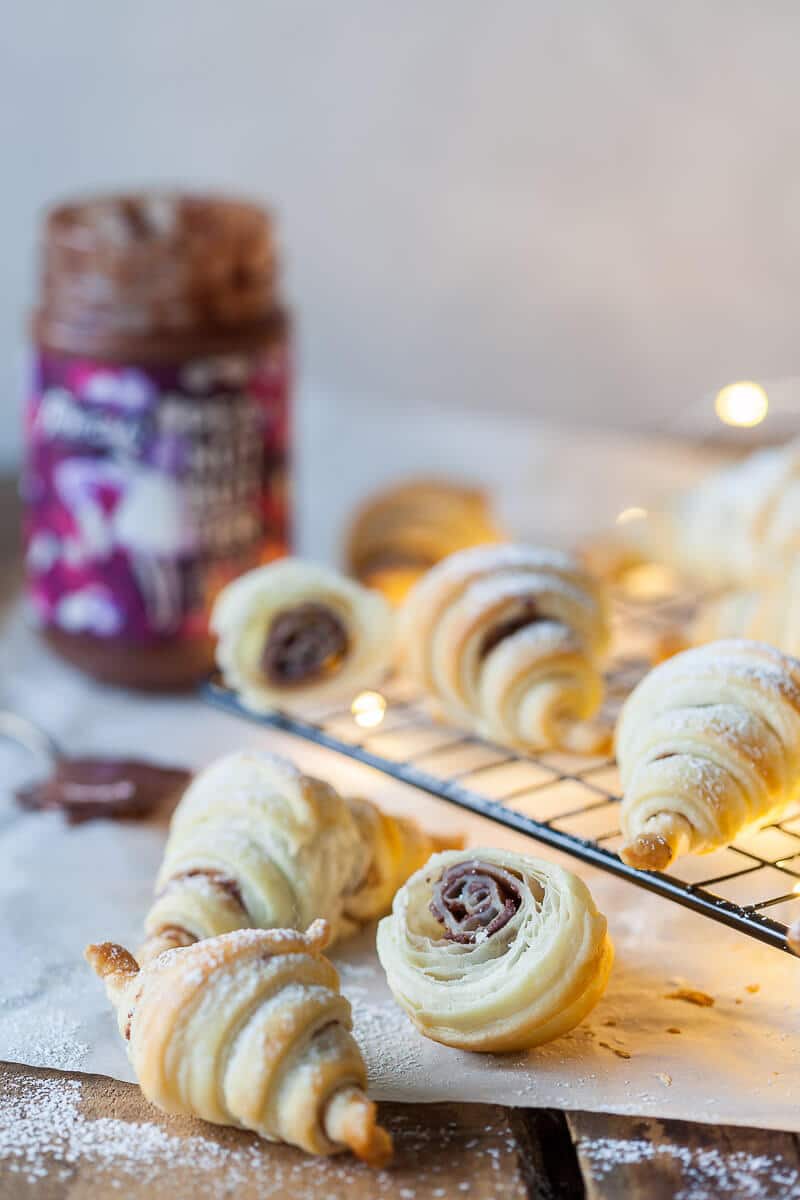 Peanut butter croissants on a cooling rack