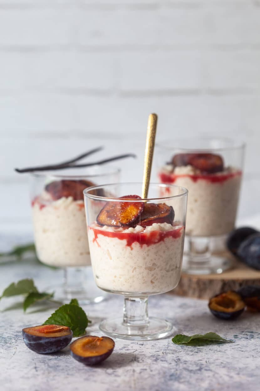 Rice Pudding with Baked Plums - Vibrant plate